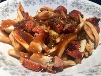 Photo de la Recette: Poutine à la Saucisses Italiennes